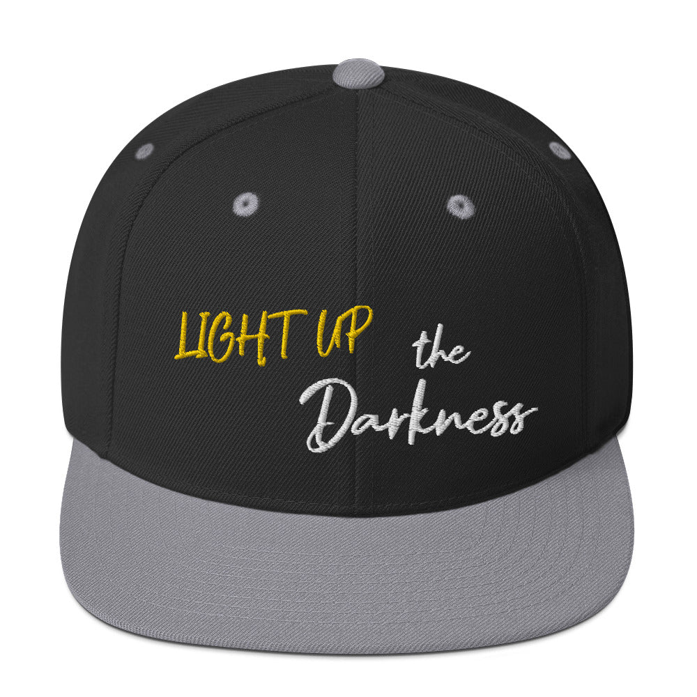 Light up the Darkness Snapback hat (white lettering)